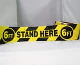 Harris Industries 3 in. x 54 ft. Vinyl 6 ft. Stand Here 6 ft. Tape in Black and Yellow HZWAS6FTSH at Pollardwater