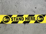 Harris Industries 3 in. x 36 yd. Vinyl 6 ft. Stand Here 6 ft. Tape in Black and Yellow HZVM6FTSH at Pollardwater