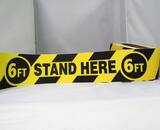 Harris Industries 3 in. x 54 ft. Vinyl 6 ft. Stand Here 6 ft. Tape in Black and Yellow HZWAS6FTSH at Pollardwater
